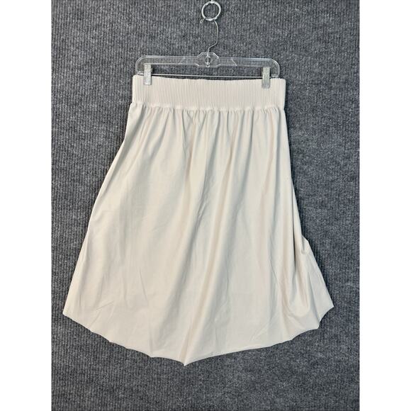 Athleta Womens Cosmic Skirt Medium Tan Stretch Performance Pockets Golf Tennis - Picture 2 of 7